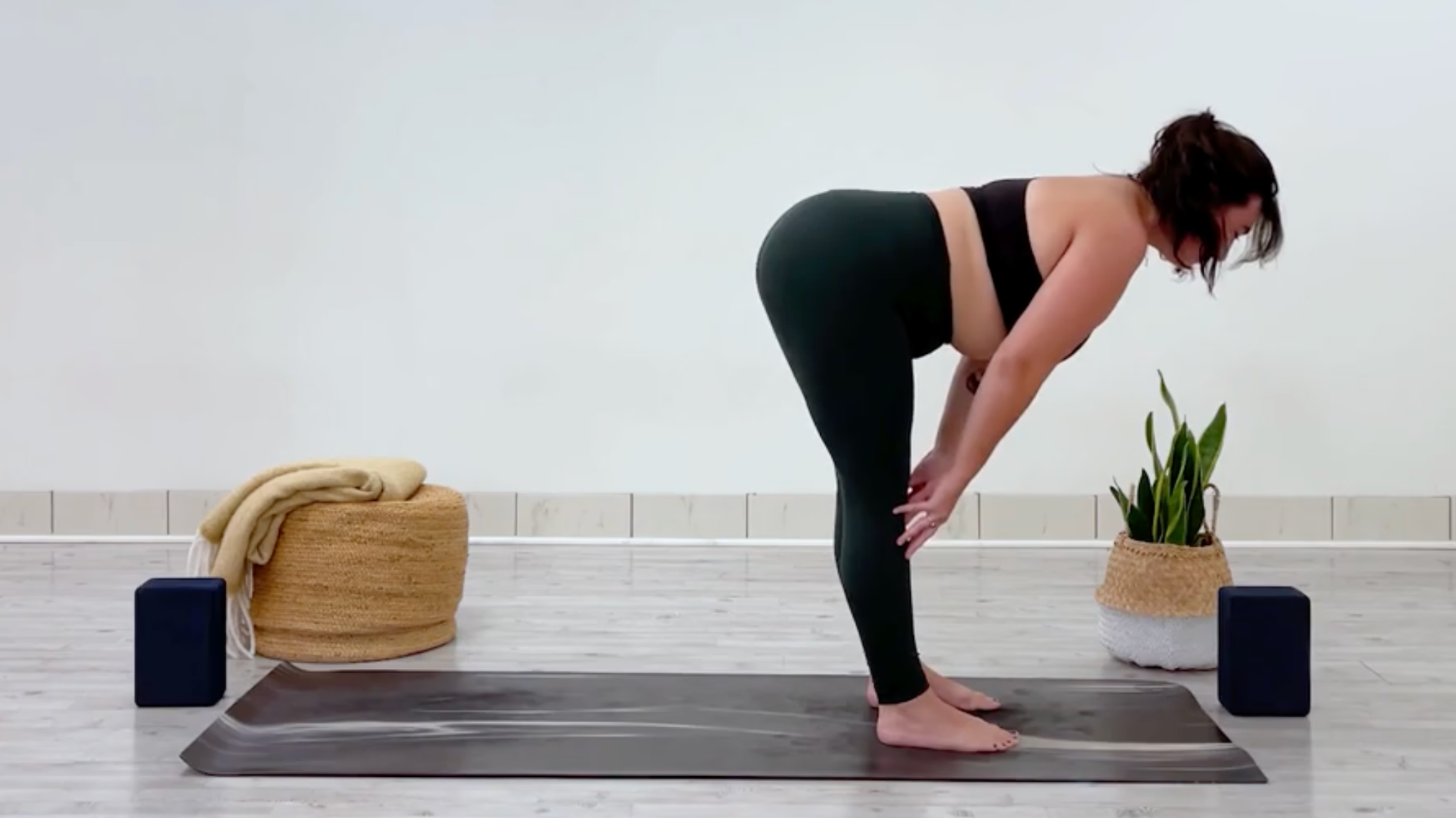 Yoga teacher Taylor Lorenz in Halfway Lift, part of her yoga for balance practice